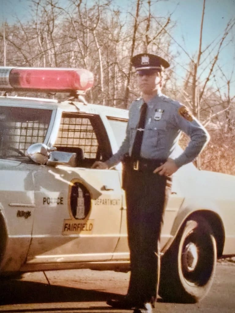 John Lucich as a uniformed Fairfield Police officer
